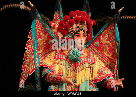 --File--A player dressed in the costume of sheng, one of the 4 main characters in Beijing Opera, performs in a theater in Haikou, south Chinas Hainan Stock Photo