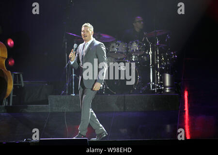 Canadian jazz singer Michael Buble performs at his concert in Hong Kong, China, March 11, 2011. Stock Photo