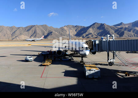 --FILE--Jet planes are pictured at the Lhasa Gonggar Airport in Lhasa city, southwest Chinas Tibet Autonomous Region, 19 February 2009.   China will s Stock Photo