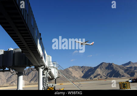 --FILE--A jet plane of Air China takes off at the Lhasa Gonggar Airport in Lhasa city, southwest Chinas Tibet Autonomous Region, 19 February 2009.   C Stock Photo