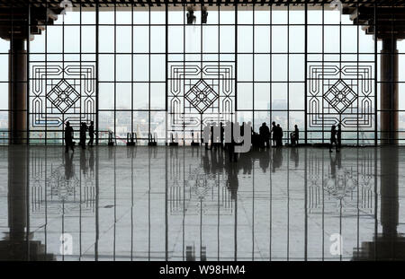 People visit the Nanjing South Railway Station, part of the Beijing-Shanghai High-speed Railway project, in Nanjing city, east Chinas Jiangsu province Stock Photo