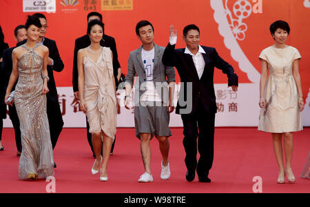 From left) Chinese actor Ren Quan, Chinese singer and actress Chen Rui,  Hong Kong actor Chow Yun-fat and Chinese actress Zhou Xun are seen at a  press Stock Photo - Alamy