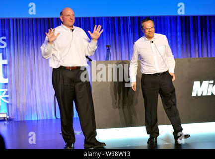 Microsoft CEO Steve Ballmer, left, delivers a speech next to Simon L. K. Leung, Corporate Vice President, Chairman and CEO of Microsoft Greater China Stock Photo