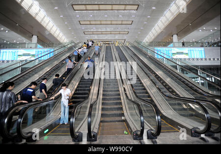 People visit the Nanjing South Railway Station, part of the Beijing-Shanghai High-speed Railway project, in Nanjing city, east Chinas Jiangsu province Stock Photo