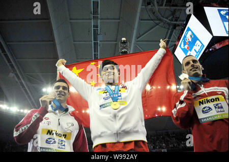 (From left) Bronze medalist Gergo Kis of Hungary, gold medalist Sun Yang of China and silver medalist Ryan Cochrane pose after the award ceremony for Stock Photo