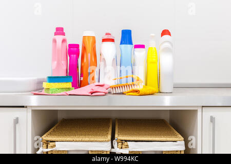 Cleaning items on the table in laundry room Stock Photo