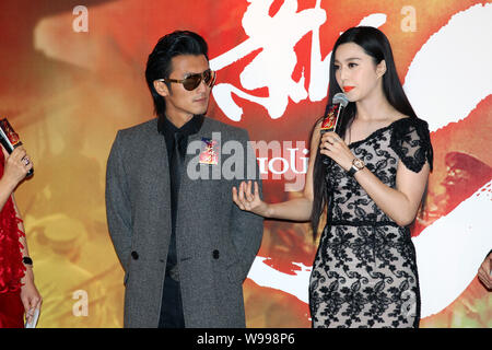 Hong Kong singer and actor Nicholas Tse (left) and Chinese actress Fan Bingbing attend the premiere of the film, Shaolin (2011), in Hong Kong, China, Stock Photo