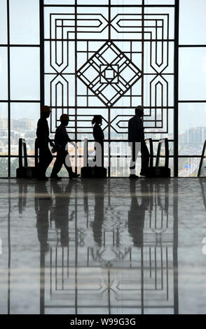 People visit the Nanjing South Railway Station, part of the Beijing-Shanghai High-speed Railway project, in Nanjing city, east Chinas Jiangsu province Stock Photo