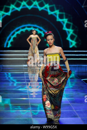 Models wearing garments with Chinese elements pose on the stage during the 6th Asian Super Model Contest in Nanning, southwest Guangxi province, 5 Sep Stock Photo