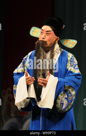 --File--A player dressed in the costume of jing, one of the 4 main characters in Beijing Opera, performs in a theater inTaipei, Taiwan, 19 April 2010. Stock Photo