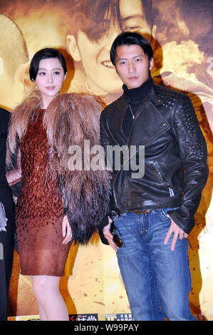 Chinese actress Fan Bingbing and Hong Kong singer and actor Nicholas Tse attend a press conference for the movie, Shaolin (2011), in Shanghai, China, Stock Photo