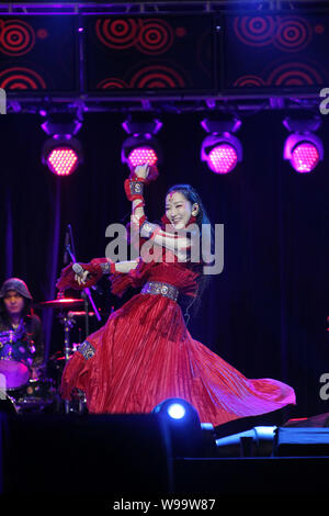 Chinese singer Sa Dingding performs at the Booey Lehoo concert in Beijing, China, 17 December 2011.   The Booey Lehoo concert was held on Saturday (17 Stock Photo