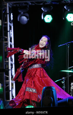 Chinese singer Sa Dingding performs at the Booey Lehoo concert in Beijing, China, 17 December 2011.   The Booey Lehoo concert was held on Saturday (17 Stock Photo