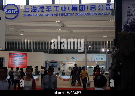 Sagw --FILE--Chinese visitors are seen at the stand of SGMW (SAIC-GM-Wuling ...