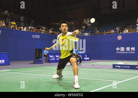 Chinas Lin Dan returns a shot to Brice Leverdez of France in the second round of mens single of China Badminton Masters 2010 in Changzhou city, east C Stock Photo