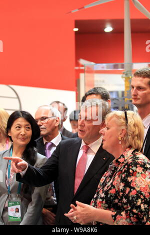 German President Horst Koehler (R2) visits the Bremen UBPA case in the Expo site in Shanghai, China, May 20, 2010, which was his last state visit befo Stock Photo