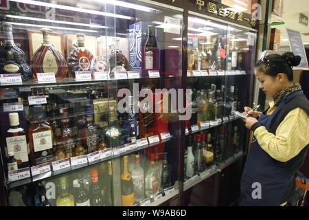Bottles of Ballantine and Chivas of Pernod Ricard SA are seen for sale at a supermarket in ...