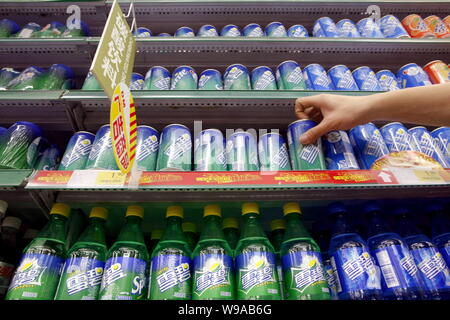 Cans of Sprite drink of Coca-Cola are seen for sale at a