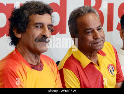 Kolkata, India. 12th Aug, 2019. Former East Bengal legendary Iranian footballer Majid Bishkar (right) and Jamsed Nassiri (left)during a press meet on the occasion of East Bengal Club's 100 years celebration program. (Photo by Saikat Paul/Pacific Press) Credit: Pacific Press Agency/Alamy Live News Stock Photo