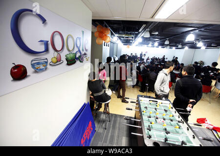 Chinese employees of seven advertising agencies protest at the Google Shanghai office in Raffles City building in Shanghai, China, 9 November 2010. Stock Photo