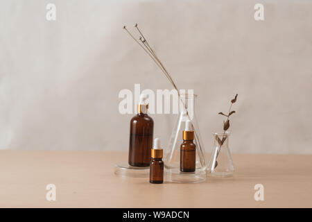Cosmetic bottle stock images. Brown cosmetic bottle with batcher. Vials on a white background Stock Photo