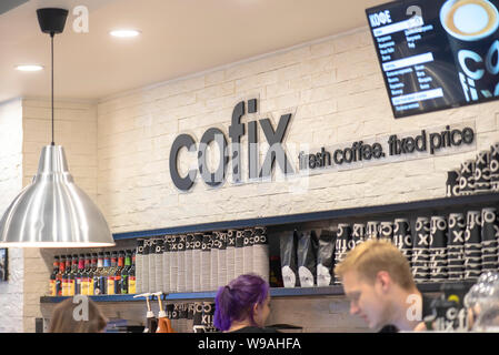 MOSCOW - AUG 12: Interior of Cofix Cafe and staff in Moscow on August 12. 2019 in Russia. Cofix is an Israeli coffee shop, bar and supermarket chain Stock Photo