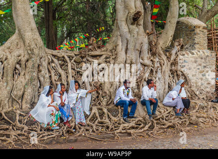 ETHIOPIA, GONDAR, JAN 19 2019: during Timkat-Festival pilgrims and worshippers come together at the bath of Fasilidas Stock Photo