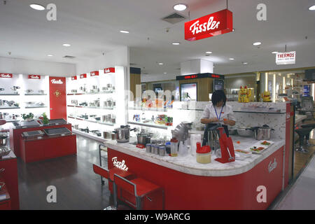 A giant fish made out of cooking utensils is on display during a  promotional event by German cookware maker Fissler at Jiuguang City Plaza  in Shanghai Stock Photo - Alamy