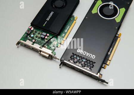 Paris, France - Aug 23, 2017: Close-up view from above of two nvidia Quadro professional GPU video cards against white background Stock Photo