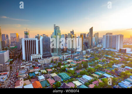 Eleveted, sunset view of Makati, the business district of Metro Manila,  Philippines
