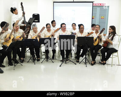 Manila, Philippines. 1st Jan, 2012. Harmonius music from the Violin, Cello and Banduria ensemble, serenades the guests during the 132nd Anniversary.Manila Mayor, Francisco ''Isko Moreno'' Domagoso, graced the 132nd Anniversary and the unveiling of the newly retrofitted building of the Philippines' National Library. Credit: Josefiel Rivera/SOPA Images/ZUMA Wire/Alamy Live News Stock Photo