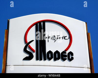 --FILE--View of the logo of Sinopec, known as China Petrochemical Corporation or China Petroleum and Chemical Corporation, at a gas station in Jilin c Stock Photo