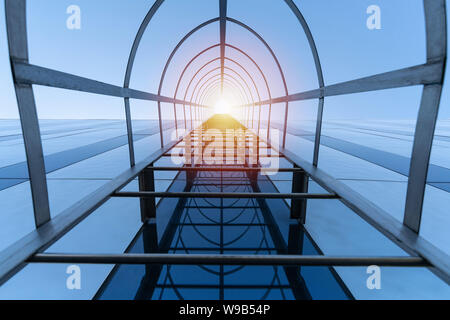 Stairway to Heaven concept. Fire escape staircase of modern shopping center. Emergency fire exit. Bottom view Stock Photo