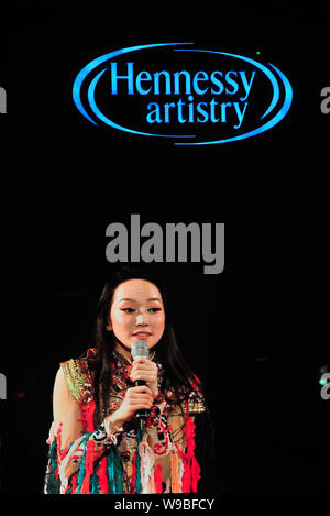 Chinese singer Sa Dingding performs at the Hennessy Artistry concert in Shanghai, China, 4 December 2010. Stock Photo