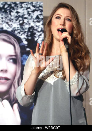New Zealand soprano Hayley Westenra sings a song at a press conference for her concert in Taipei, Taiwan, October 25, 2010. Stock Photo