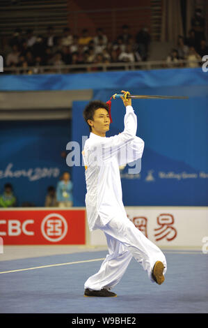 Chinas Wu Yanan competes in the mens Wushu Taijijian at the 16th Asian ...