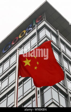 --FILE--The Chinese flag flutters in front of the headquarters of Google China in Beijing, China, 30 June 2010.   Googles application to renew its web Stock Photo