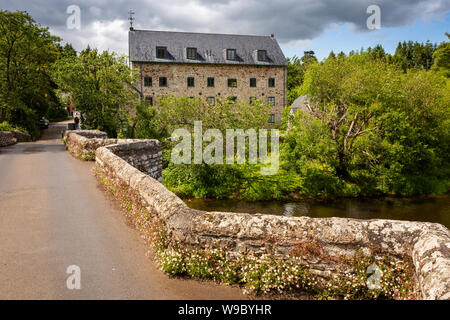 UK, England, Devon, Staverton, old stone bridge over River Dart, beside Old Mill converted to private house Stock Photo