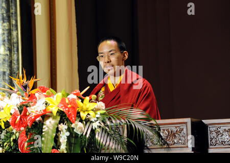 --FILE--The 11th Panchen Lama, Bainqen Erdini Qoigyijabu, speaks during the opening ceremony of the 2nd World Buddhist Forum in Wuxi, east Chinas Jian Stock Photo