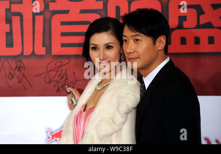 Hong Kong singer and actor Leon Lai, right, and Hong Kong actress and model Michelle Reis (Michelle Lee) are seen during the global premiere of the mo Stock Photo