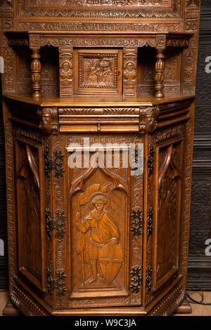 Ireland, Leinster, Fingal, Co Dublin, Malahide Castle, interior, Oak Room, ornately carved 1598 Talbot family cabinet with St George decoration Stock Photo
