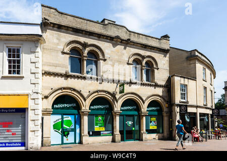 The Paddy Powers bookmaker shop in Trowbridge Wiltshire, occupying a listed building in renaissance Italianate of Bath stone. Stock Photo