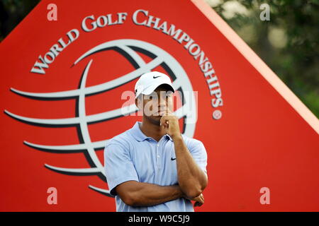 World number one golfer Tiger Woods of the United States thinks during the second round of the HSBC Champions golf tournament at the Sheshan Internati Stock Photo