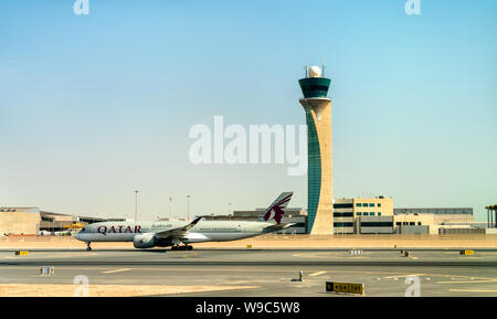 Airbus A350 of Qatar Airways at Hamad International Airport in Doha, Qatar Stock Photo