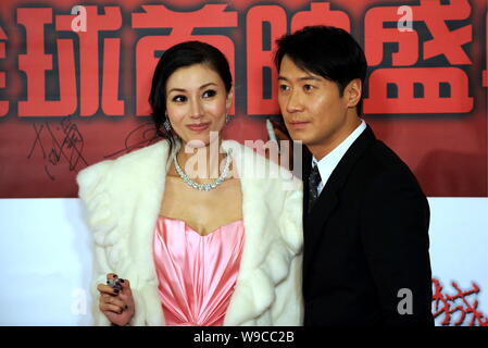 Hong Kong singer and actor Leon Lai, right, and Hong Kong actress and model Michelle Reis (Michelle Lee) are seen during the global premiere of the mo Stock Photo