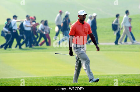 World number one golfer Tiger Woods of the United States is seen during the first round of the HSBC Champions golf tournament at the Sheshan Internati Stock Photo