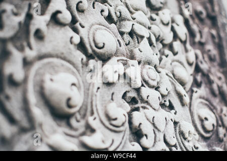Closeup on facade ornament detail of Angkor Wat ancient temple in Cambodia. Stock Photo