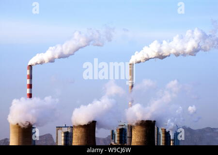 --FILE--Smoke is seen being emitted from chimneys at a chemical plant in Beijing, China, 28 January 2009.   The cost of reducing Chinas total greenhou Stock Photo