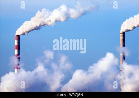 --FILE--Smoke is seen emitted from chimneys of a plant in Beijing, China, 28 January 2009.   China will include a pilot emissions trading scheme in it Stock Photo