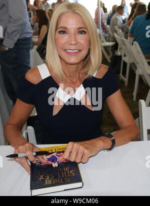 East Hampton, NY, USA. 10th Aug, 2019. Candace Bushnell at the East Hampton Library Authors night on August 10, 2019 in East Hampton, NY. Credit: Mpi98/Media Punch/Alamy Live News Stock Photo